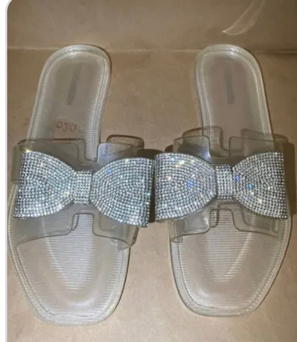 Steve Madden "Waller" Clear Jelly Rhinestone Bow Slide Sandals
Size 8